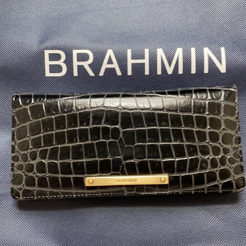 This new Brahmin wallet has 12 card slots.  New without tags.  A Beautiful gift